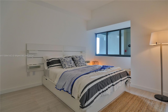 bedroom featuring light wood-type flooring