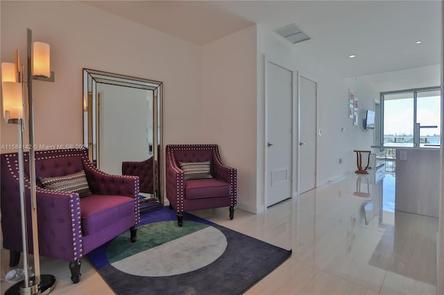 sitting room featuring tile flooring