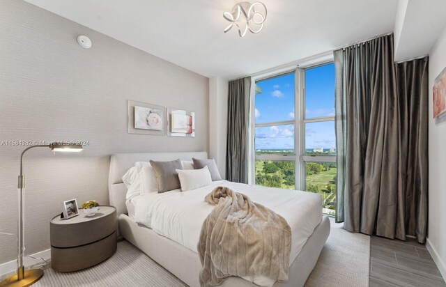 bedroom with light wood-type flooring