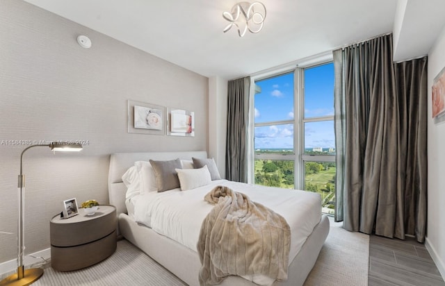 bedroom with light hardwood / wood-style floors