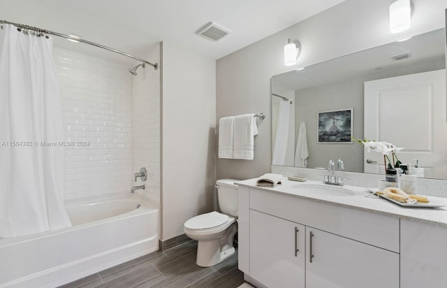 full bathroom with shower / bathtub combination with curtain, toilet, and vanity