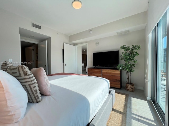 bedroom featuring tile flooring