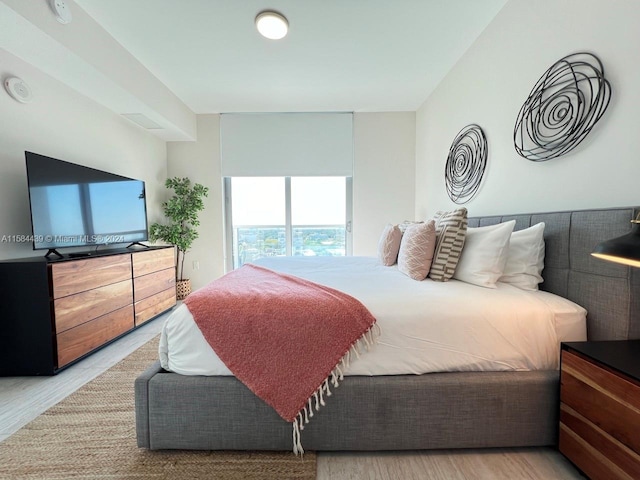 bedroom with light hardwood / wood-style floors