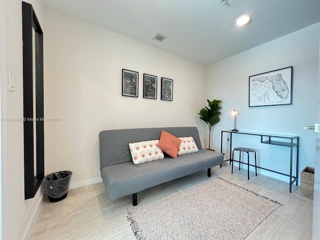 living area featuring hardwood / wood-style flooring