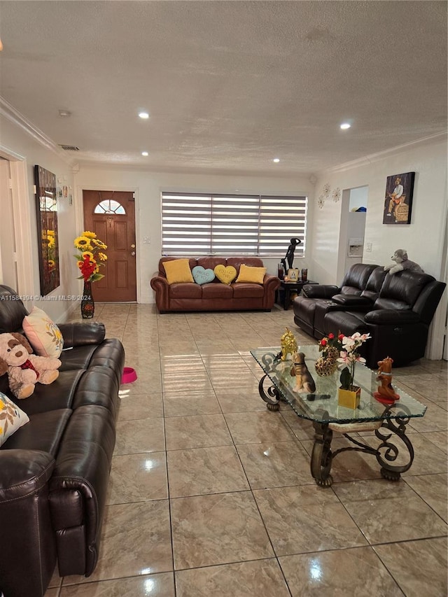 tiled living room with crown molding and a textured ceiling