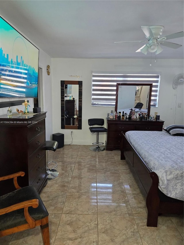 bedroom featuring ceiling fan