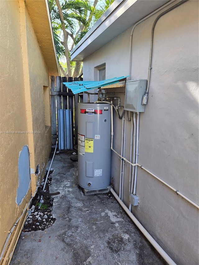 utility room with water heater