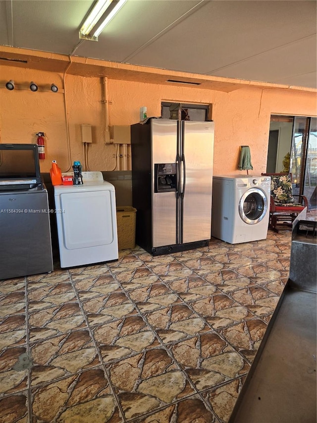 laundry area featuring washer and clothes dryer