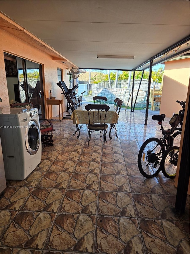 interior space with a healthy amount of sunlight and washer / clothes dryer