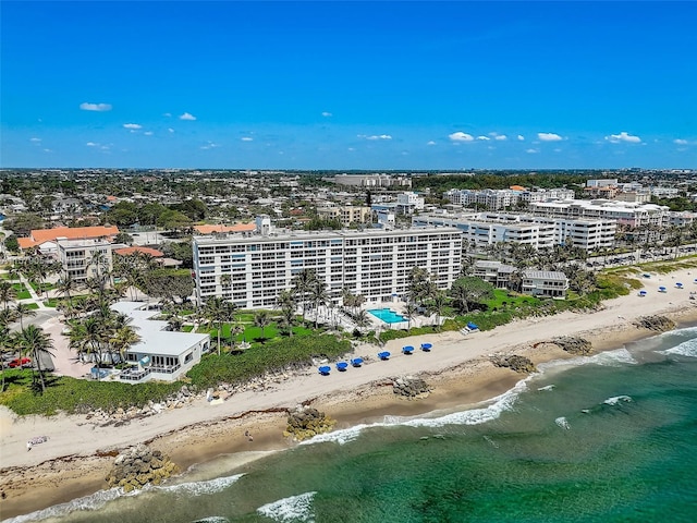 drone / aerial view with a view of the beach and a water view