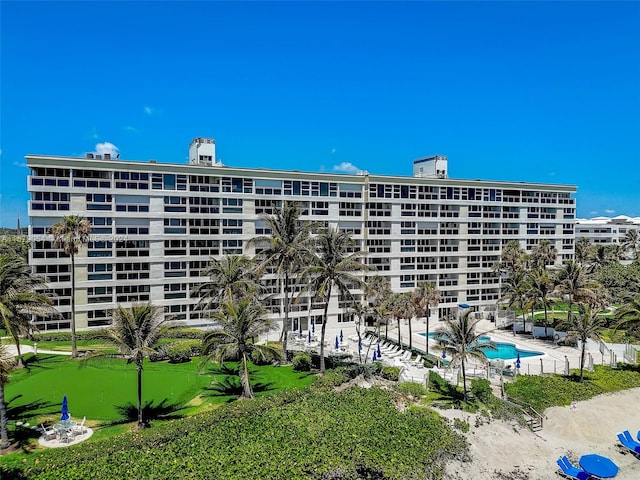 view of property featuring a community pool