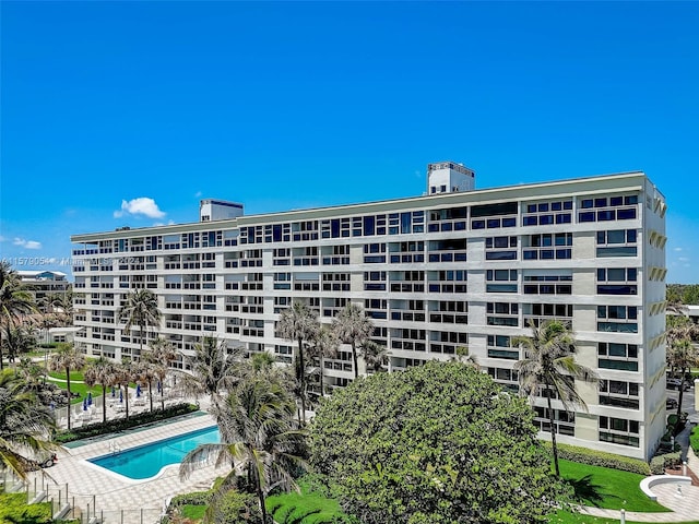 view of property featuring a community pool