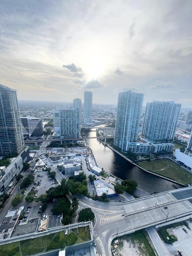 birds eye view of property featuring a water view