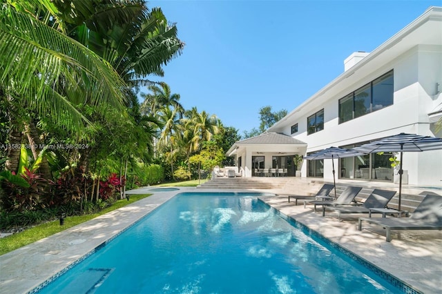 view of pool with a patio area