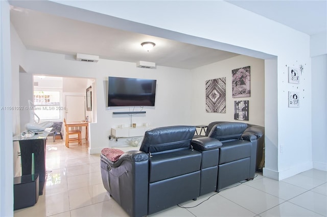 living room with light tile patterned flooring