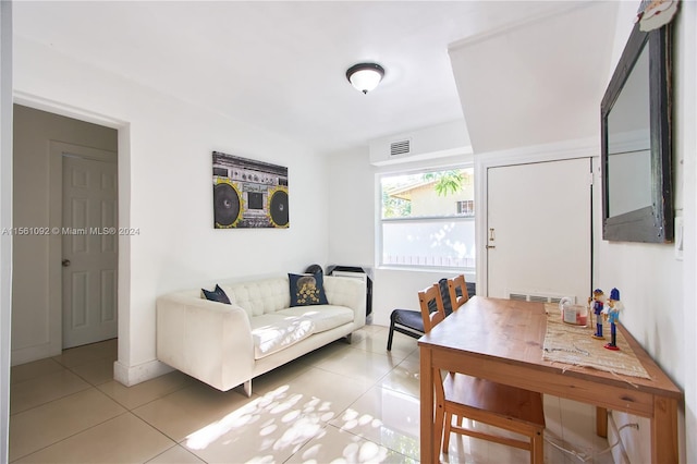 living room with light tile patterned floors