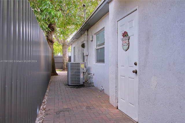 exterior space with a patio area and central AC unit