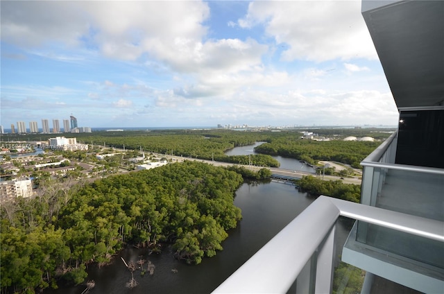 balcony featuring a water view