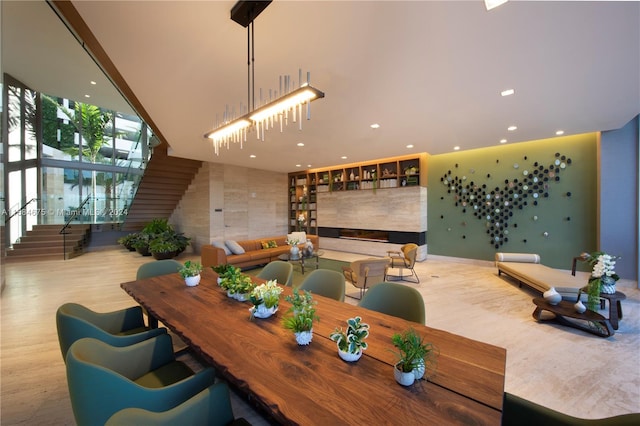 dining space with light hardwood / wood-style flooring