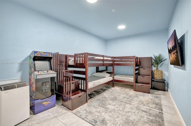 bedroom with light tile floors