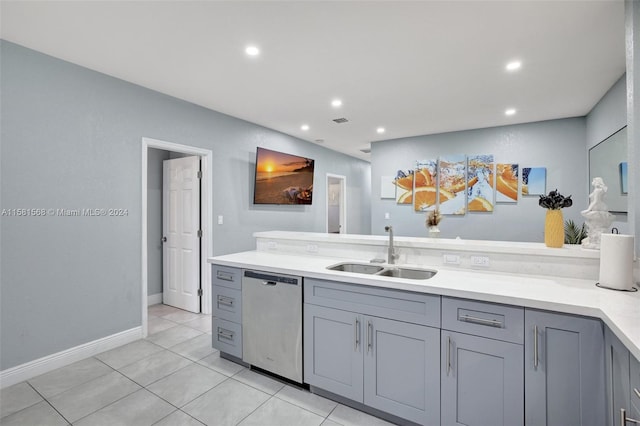 bathroom with tile floors and sink