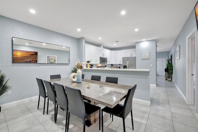 view of tiled dining space