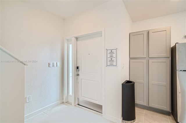 view of tiled foyer