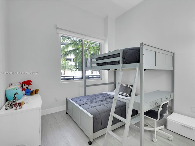 bedroom with light hardwood / wood-style floors