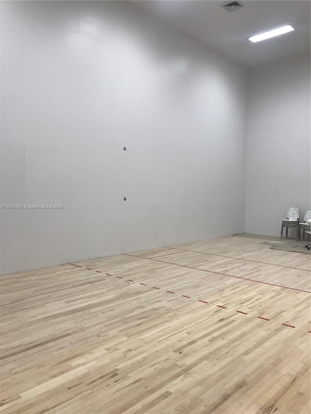 spare room with light wood-type flooring