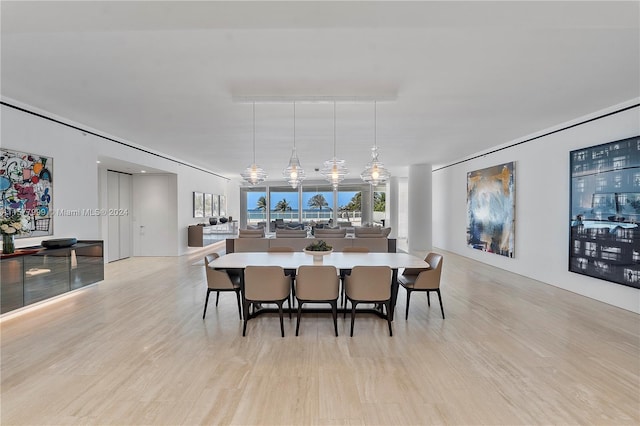 dining area with light wood-type flooring