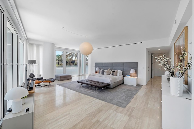 bedroom featuring light hardwood / wood-style floors