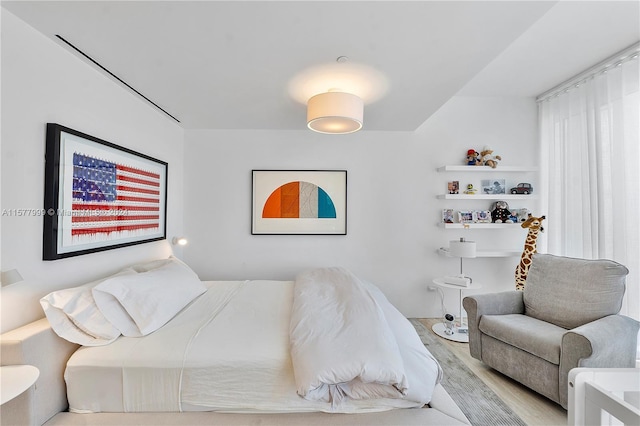 bedroom featuring light wood-type flooring