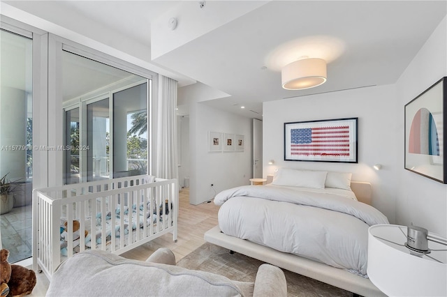 bedroom featuring light hardwood / wood-style flooring