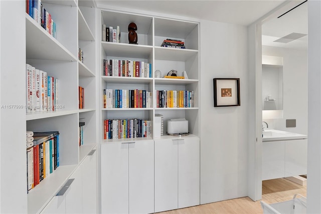 interior space with hardwood / wood-style floors