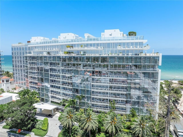 view of building exterior with a water view