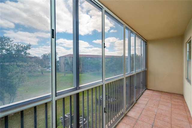 unfurnished sunroom featuring plenty of natural light