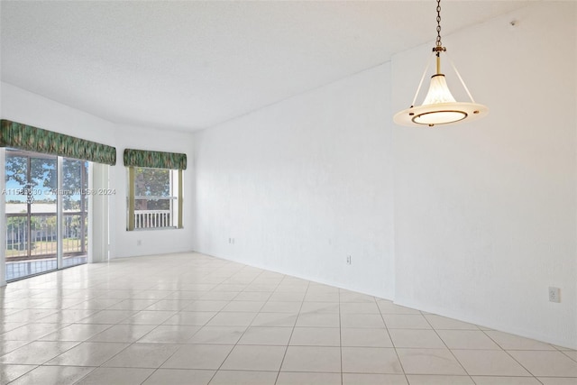 empty room with light tile floors