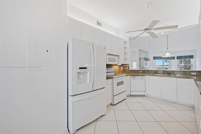 kitchen featuring hanging light fixtures, white appliances, ceiling fan, tasteful backsplash, and light tile floors