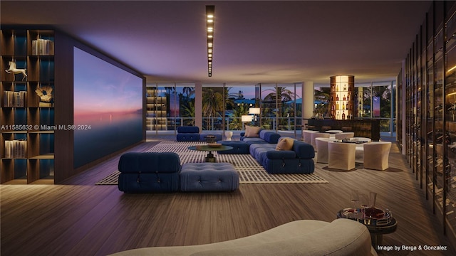 living room with expansive windows and hardwood / wood-style flooring