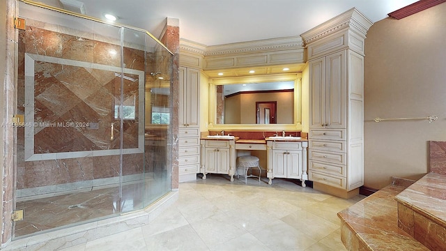 bathroom with tile flooring, vanity, and a shower with door