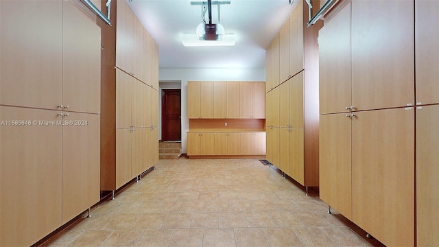 hallway with light tile flooring