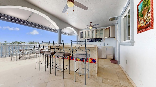 view of terrace with ceiling fan