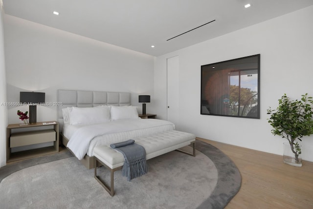 bedroom featuring light wood-type flooring