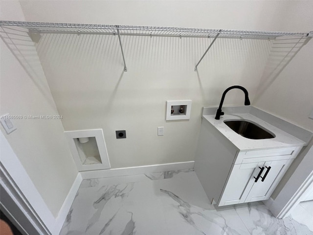 laundry area featuring light tile flooring, electric dryer hookup, and washer hookup