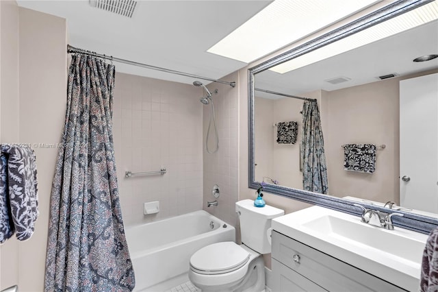 full bathroom with toilet, shower / bath combo, vanity, and tile patterned flooring