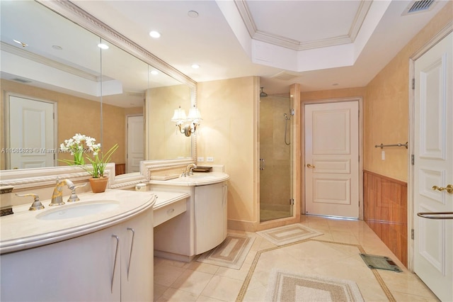 bathroom with tile flooring, an enclosed shower, a raised ceiling, and large vanity