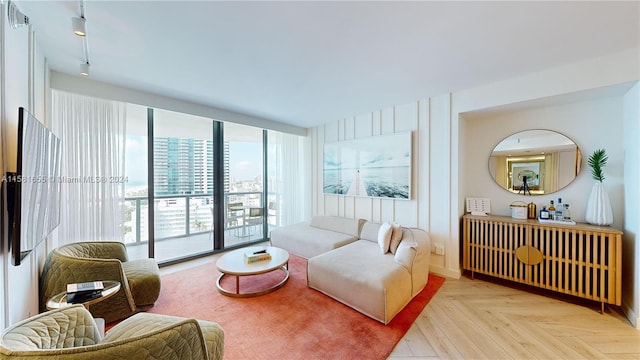 living room featuring light parquet floors