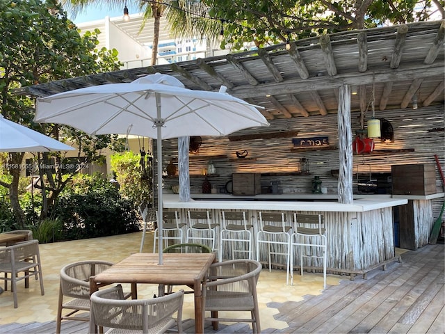 deck with an outdoor bar