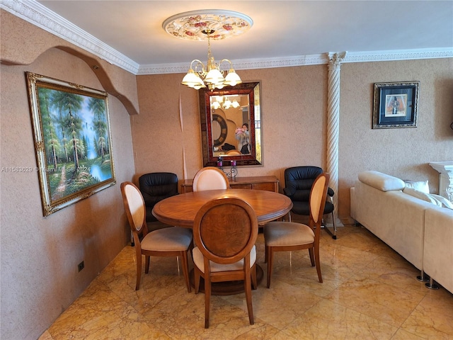 dining room featuring crown molding and a chandelier