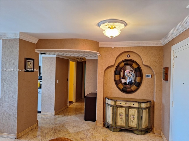 hallway featuring crown molding